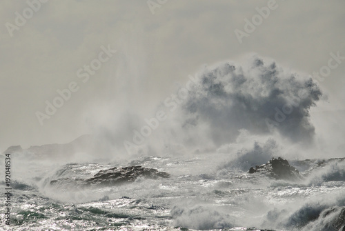 Rocky coast with rough sea and big wave when breaking, Telde, Gran canaria, canary islands