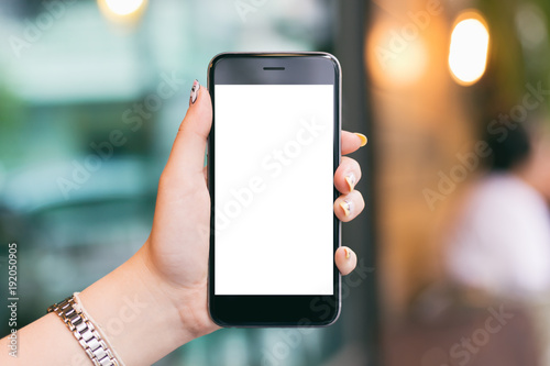 Woman hand holding mobile smartphones isolated white screen for mockup design and others app display background