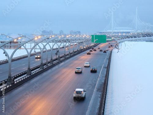 speed road in the winter evening
