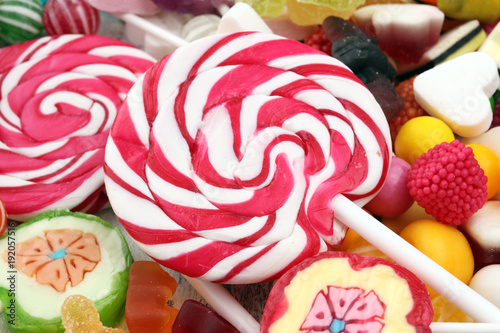 candies with jelly and sugar. colorful array of different childs sweets and treats