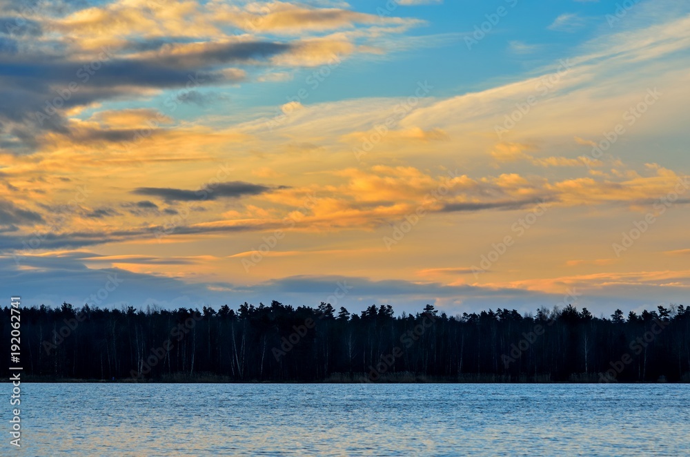 Beautiful sunrise landscape. Colorful sky and trees. Beautiful sunrise landscape. Colorful sky and trees.