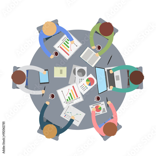 Office meeting at round table.