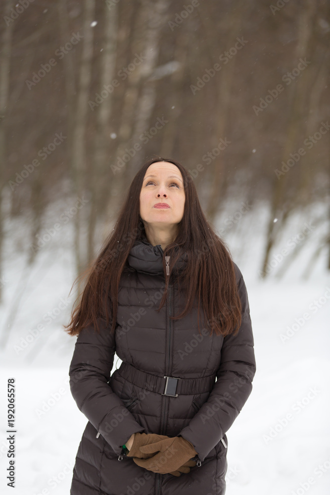 Young beautiful girl posing in winter Park Young beautiful girl posing in winter Park