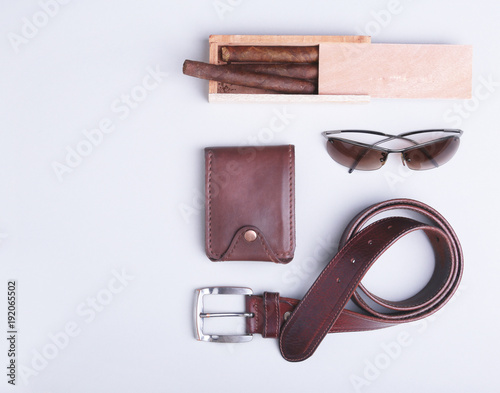 Men s accessories for business and rekreation. A professional studio photograph of men s business accessories. Top view composition