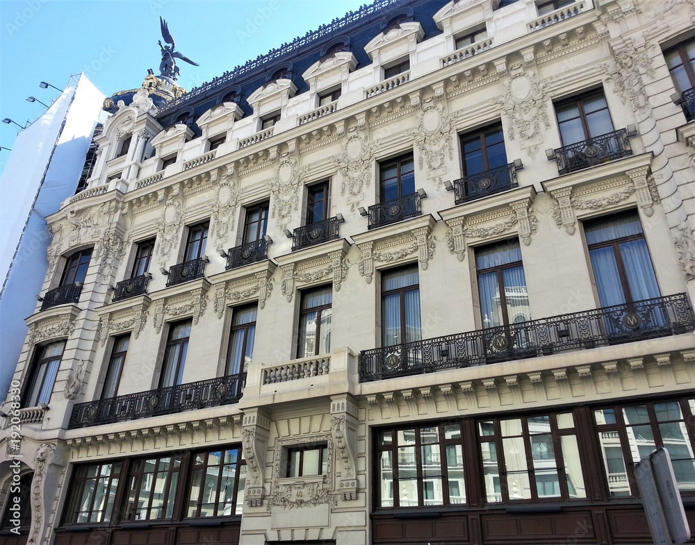 Obraz premium Famous house in the Gran Via of Madrid