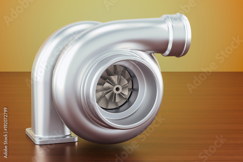 Car turbocharger on the wooden table. 3D rendering