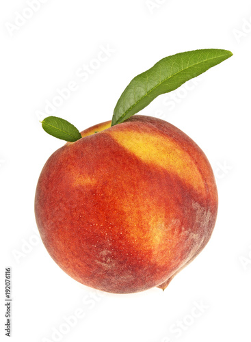 Peach with leaf isolated on white background