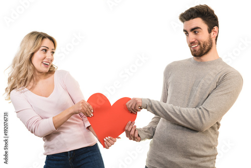 The man and woman holding a heart symbol on the white background
