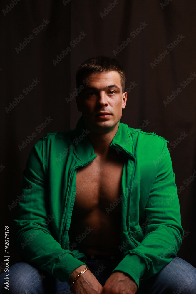 Fototapeta premium closeup .stylish guy in the green shirt.