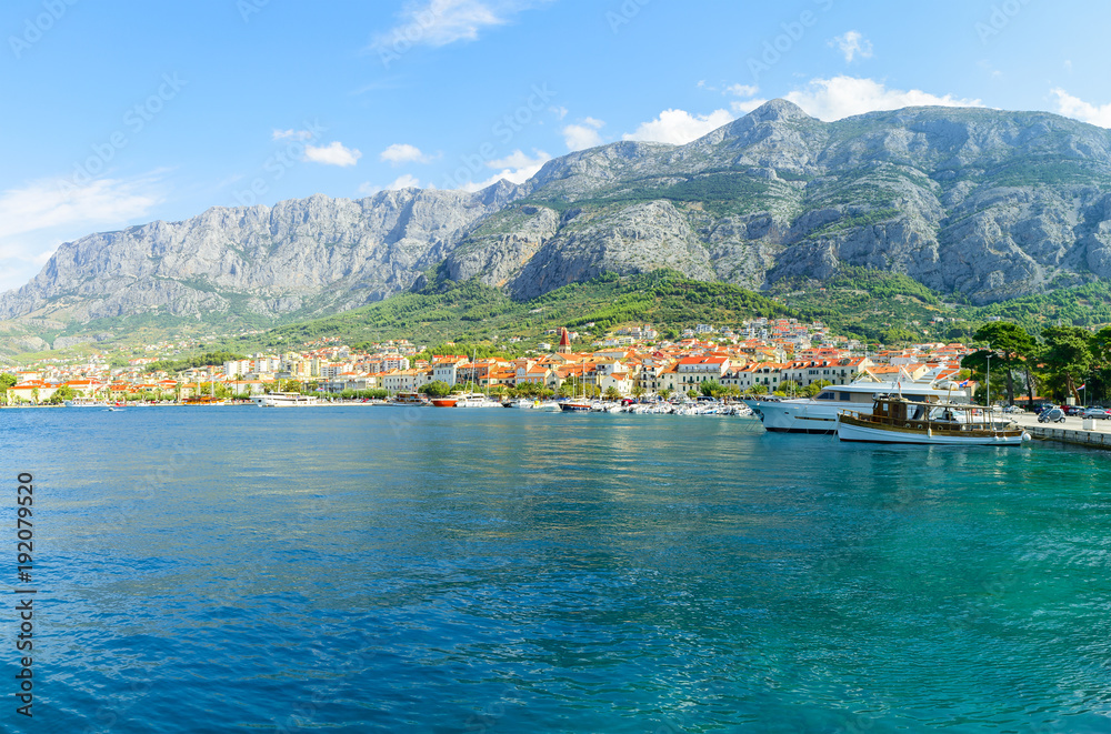 beautiful view from Adriatic sea with yachts of town Makarska, Dalmatia, Croatia