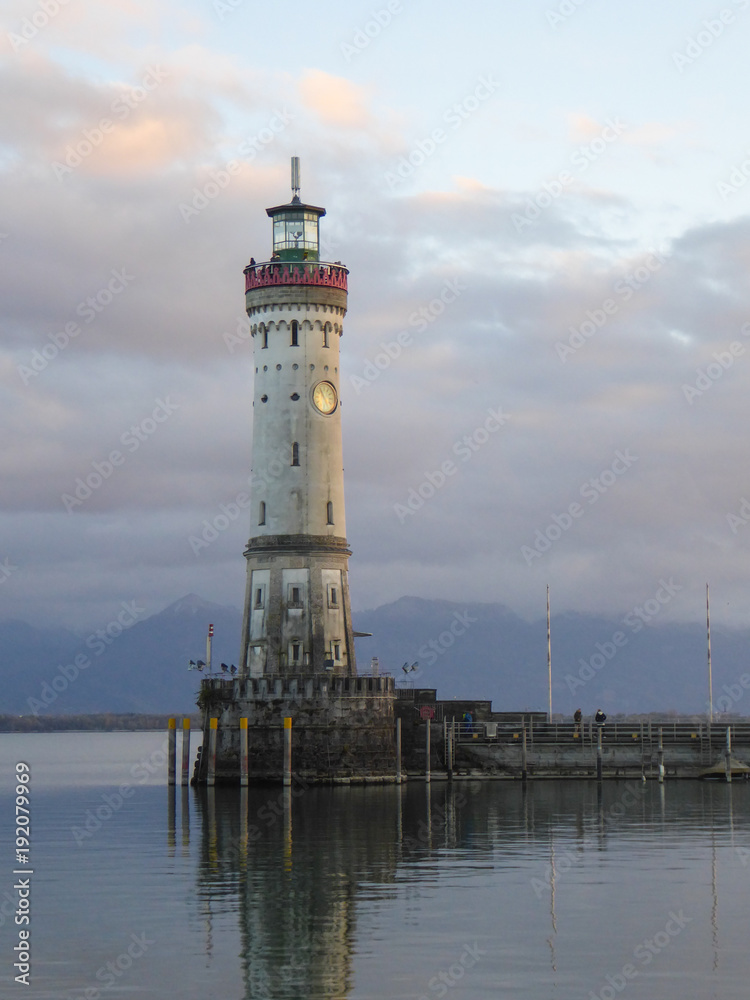 Historic lighthouse at Lindadu harbor entrance on Lake Constance Germany