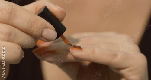 woman hand. making manicure before going to work. photo