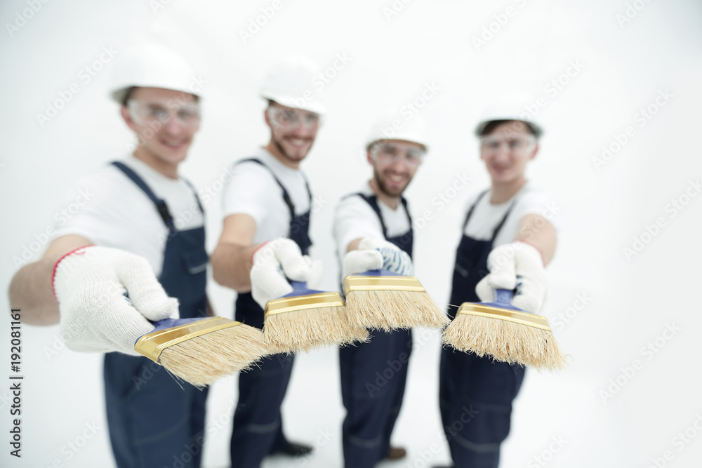 group of construction workers .isolated on white group of construction workers .isolated on white