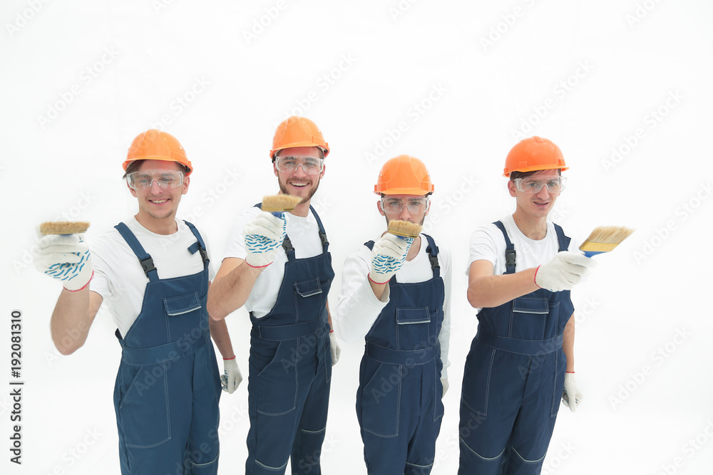 view from the top. a group of builders .isolated on white view from the top. a group of builders .isolated on white