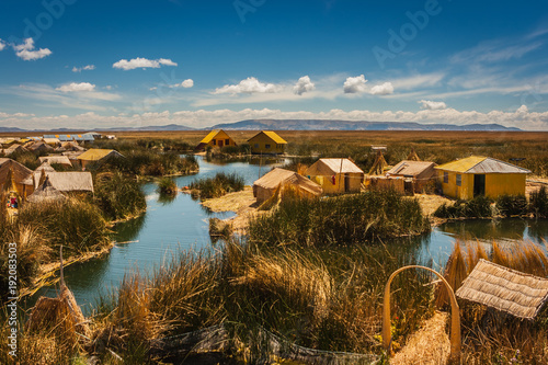 The Uros island from a boat on the Titicaca Lake, Peru photo