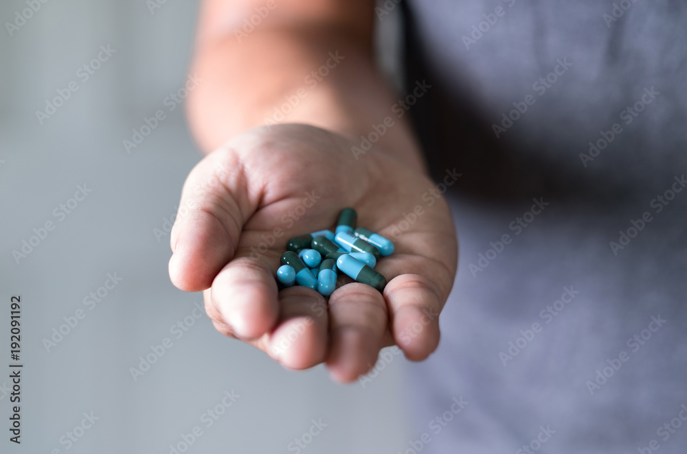 pills and medicines in the hand pharmaceutical medicine pharmacy
