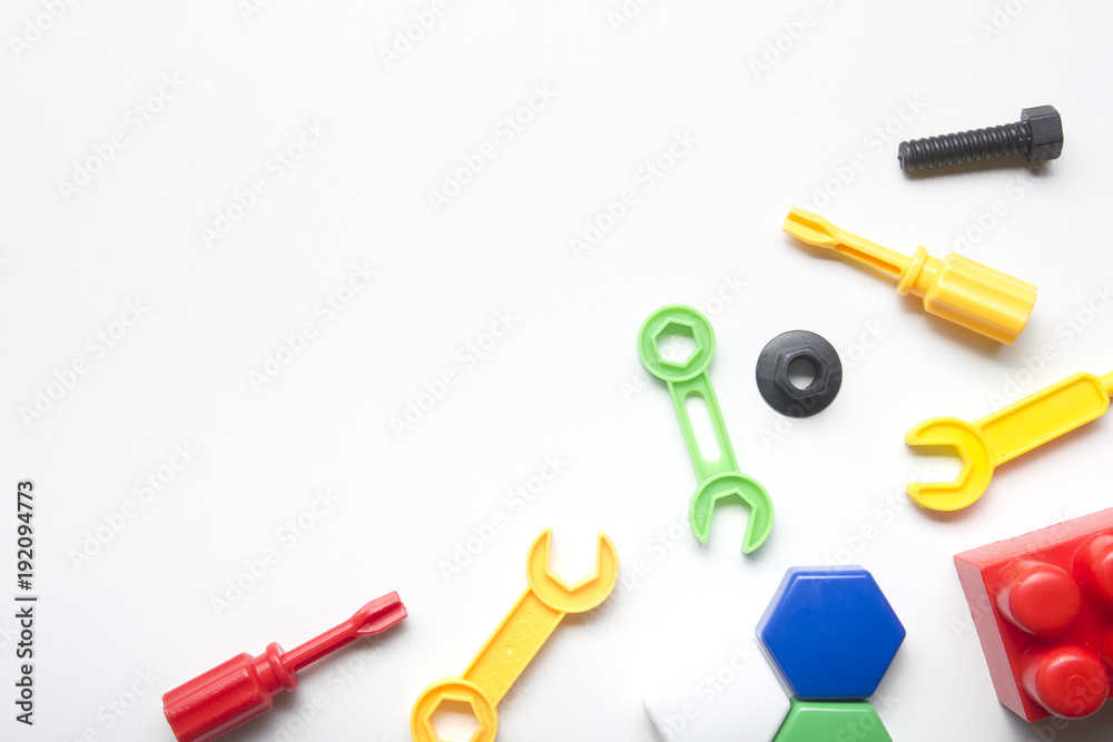 Kids educational developing toys frame on white background. Top view. Flat lay. Copy space for text