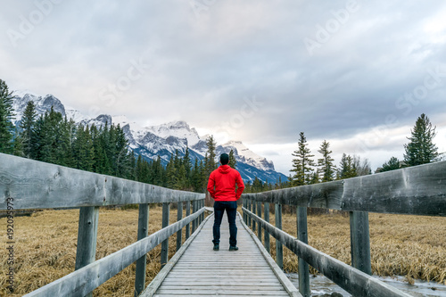 Red man on a bridge