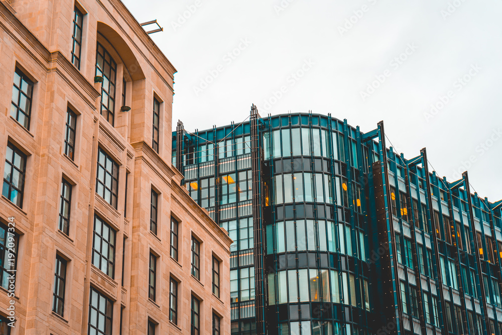 orange and steel glass facaded finance houses at england orange and steel glass facaded finance houses at england