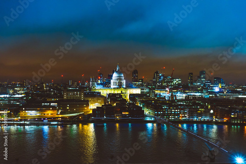 beautiful cityscape overview of london in the night with st pauls church in the middle