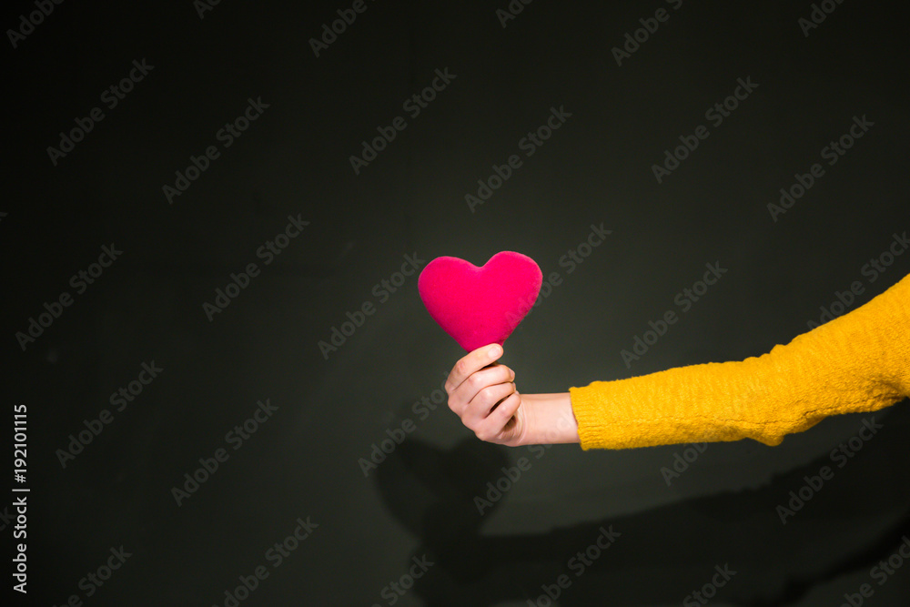 Health insurance or love concept with hand and heart Health insurance or love concept with hand and heart