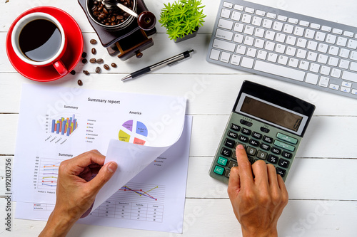 Businessman hand working with financial data