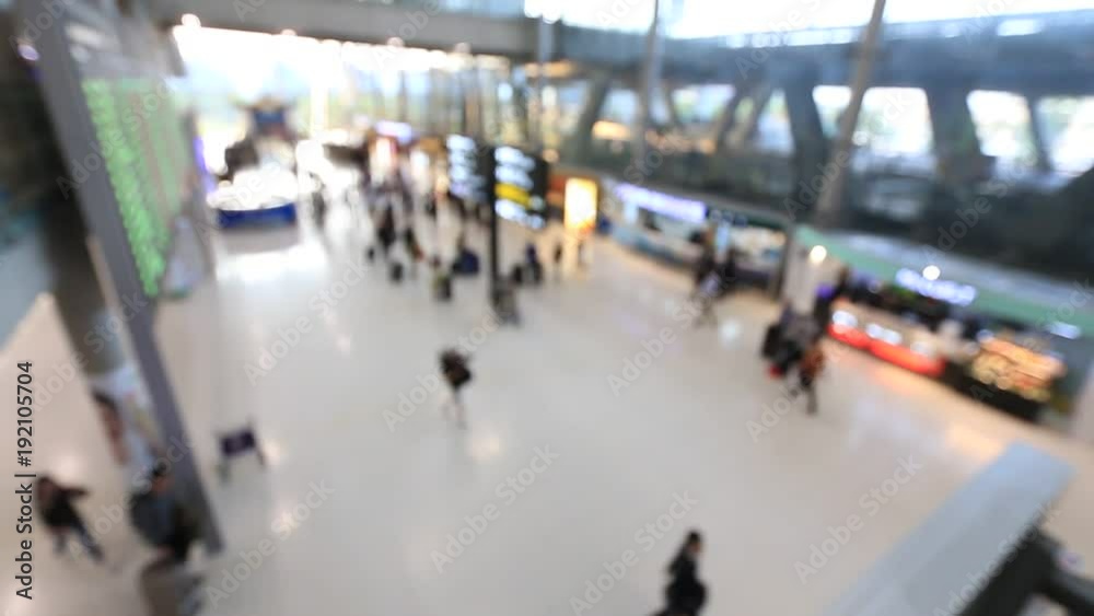 Top view of abstract blur airport terminal with commuter crowd of people and passenger walking when track arriving or departing flights, Blurred busy Airport Terminal footage concept. Full HD1920x1080 Top view of abstract blur airport terminal with commuter crowd of people and passenger walking when track arriving or departing flights, Blurred busy Airport Terminal footage concept. Full HD1920x1080