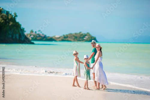 Happy beautiful family on the beach