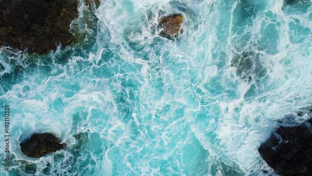 Top down view of waves and clifs