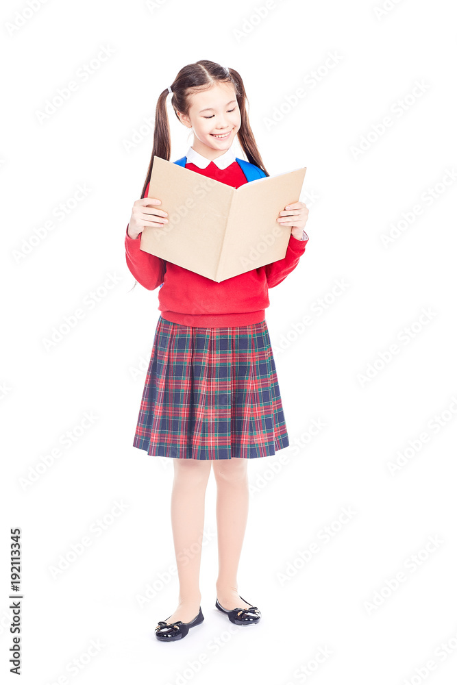 Full length portrait of Korean schoolgirl holding open notebook Full length portrait of Korean schoolgirl holding open notebook