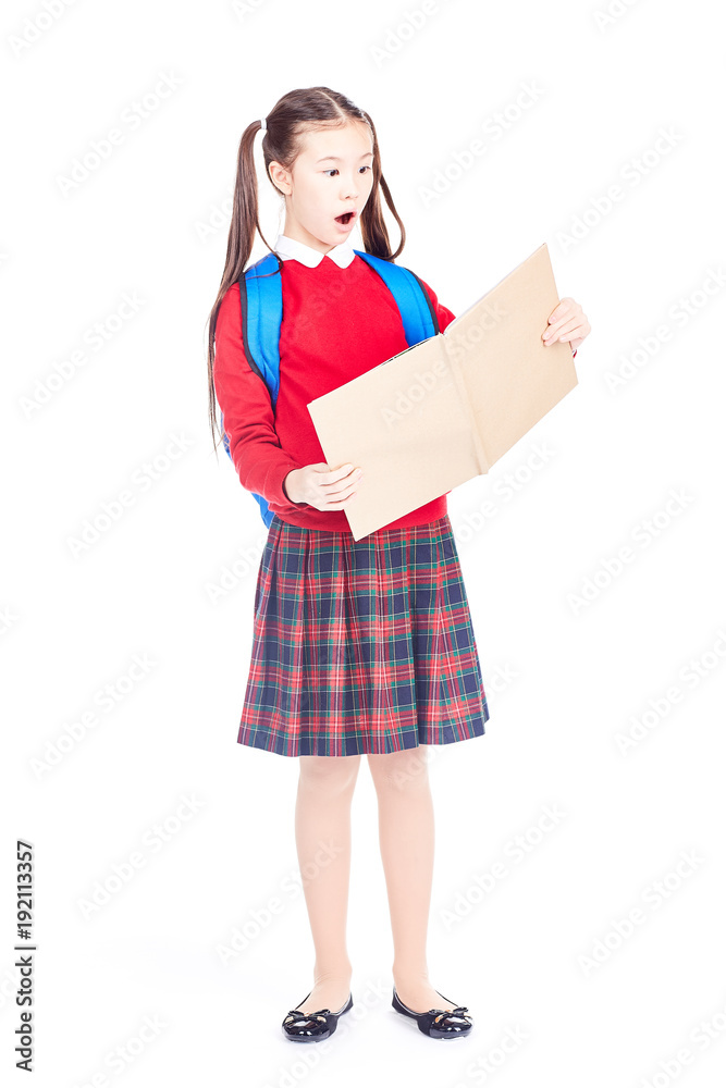 Full length portrait of Korean schoolgirl holding open notebook Full length portrait of Korean schoolgirl holding open notebook