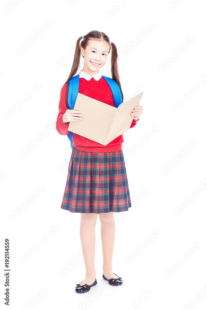 Full length portrait of Korean schoolgirl holding open notebook Full length portrait of Korean schoolgirl holding open notebook