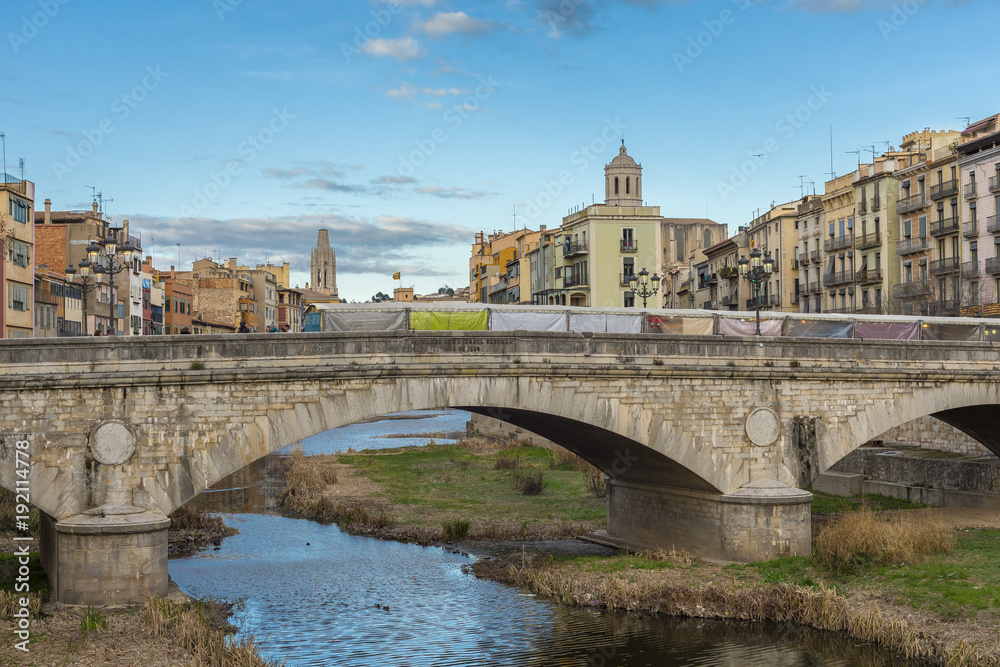 Catalan city Girona skyline with famous bridge and cathedral landmark