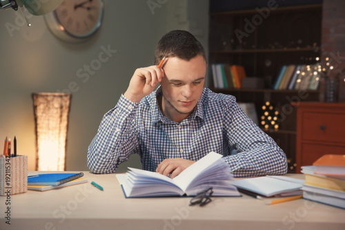 Student doing homework indo...
