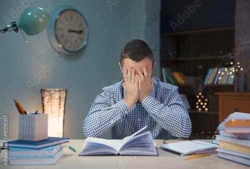 Student doing homework indo...