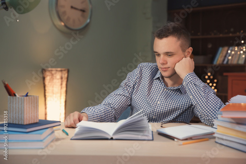 Student doing homework indo...