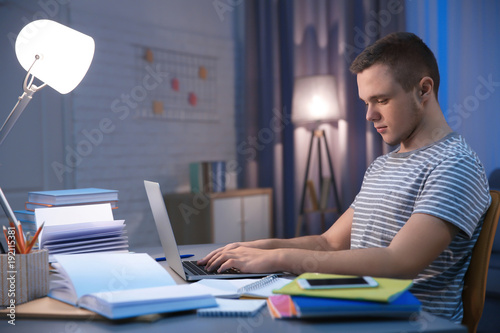 Student doing homework indo...