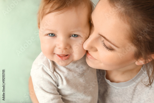 Young mother with her cute ...