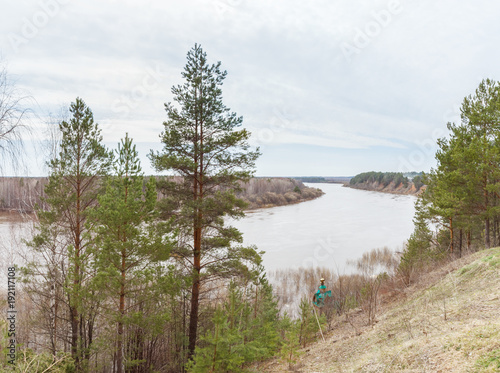 The Vetluga River with pines on the shore