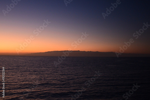 Travelling from Tenerife to La Gomera in the twilight with a ferry, view to the island La Gomera © fmb