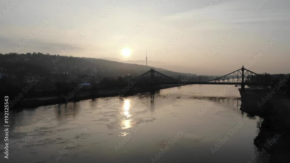 Aerial drone shot of Dresden Loschwitzer Bridge Blaues Wunder early morning with beautiful sunrise scenery Germany Aerial drone shot of Dresden Loschwitzer Bridge Blaues Wunder early morning with beautiful sunrise scenery Germany