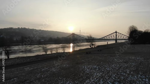 Aerial drone shot of Dresden Loschwitzer Bridge Blaues Wunder early morning with beautiful sunrise scenery Germany photo