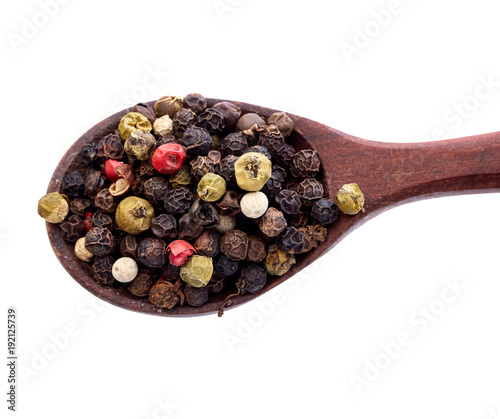 Shichimi pepper in Wooden spoon on white background,Blend of spices photo