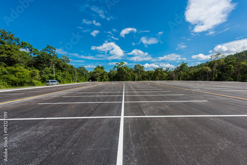 Empty space parking lot outdoor in public park.