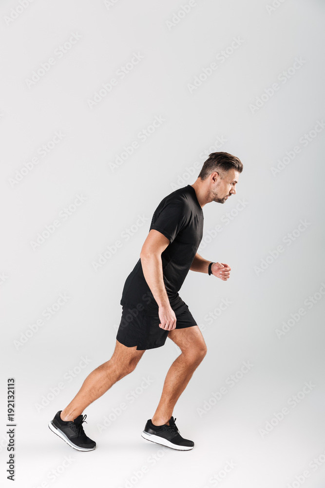 Full length portrait of a healthy mature sportsman running Full length portrait of a healthy mature sportsman running