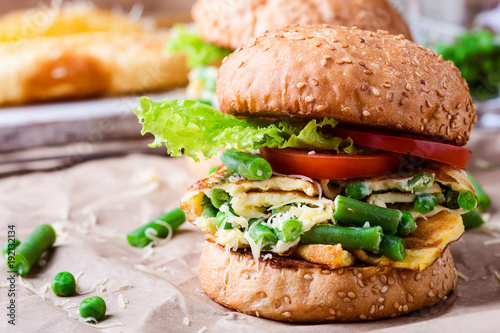 Egg omelet burgers with  green beans and peas