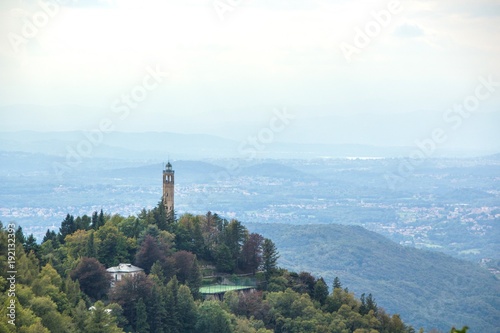 Beautiful mountain landscape, views of the Lighthouse Voltiano. Lighthouse named Alessandro Volta. View of the light house of Como. Lombardy. Italy.
