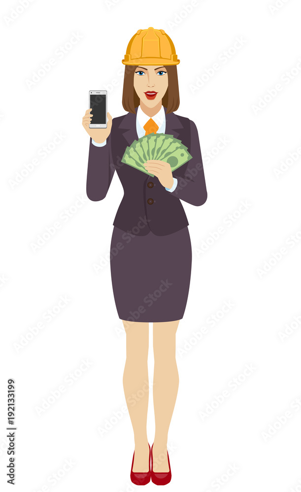 Businesswoman in construction helmet holding a mobile phone and money Businesswoman in construction helmet holding a mobile phone and money
