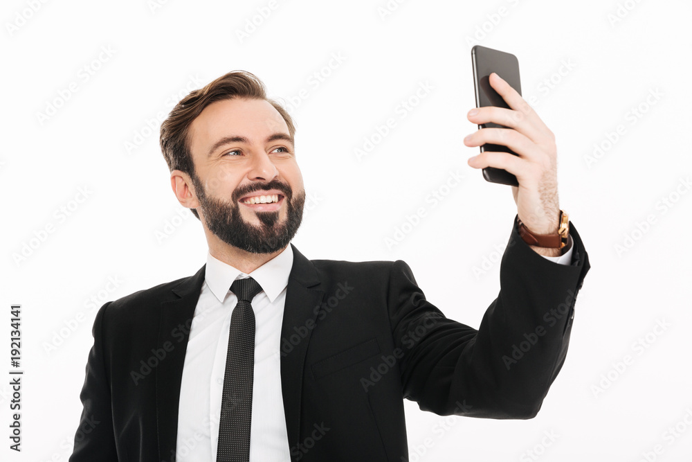 Happy young businessman make selfie by mobile phone. Happy young businessman make selfie by mobile phone.