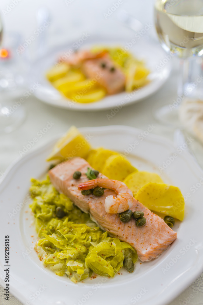 A delicious dish with salmon and cream pores with potatoes. 